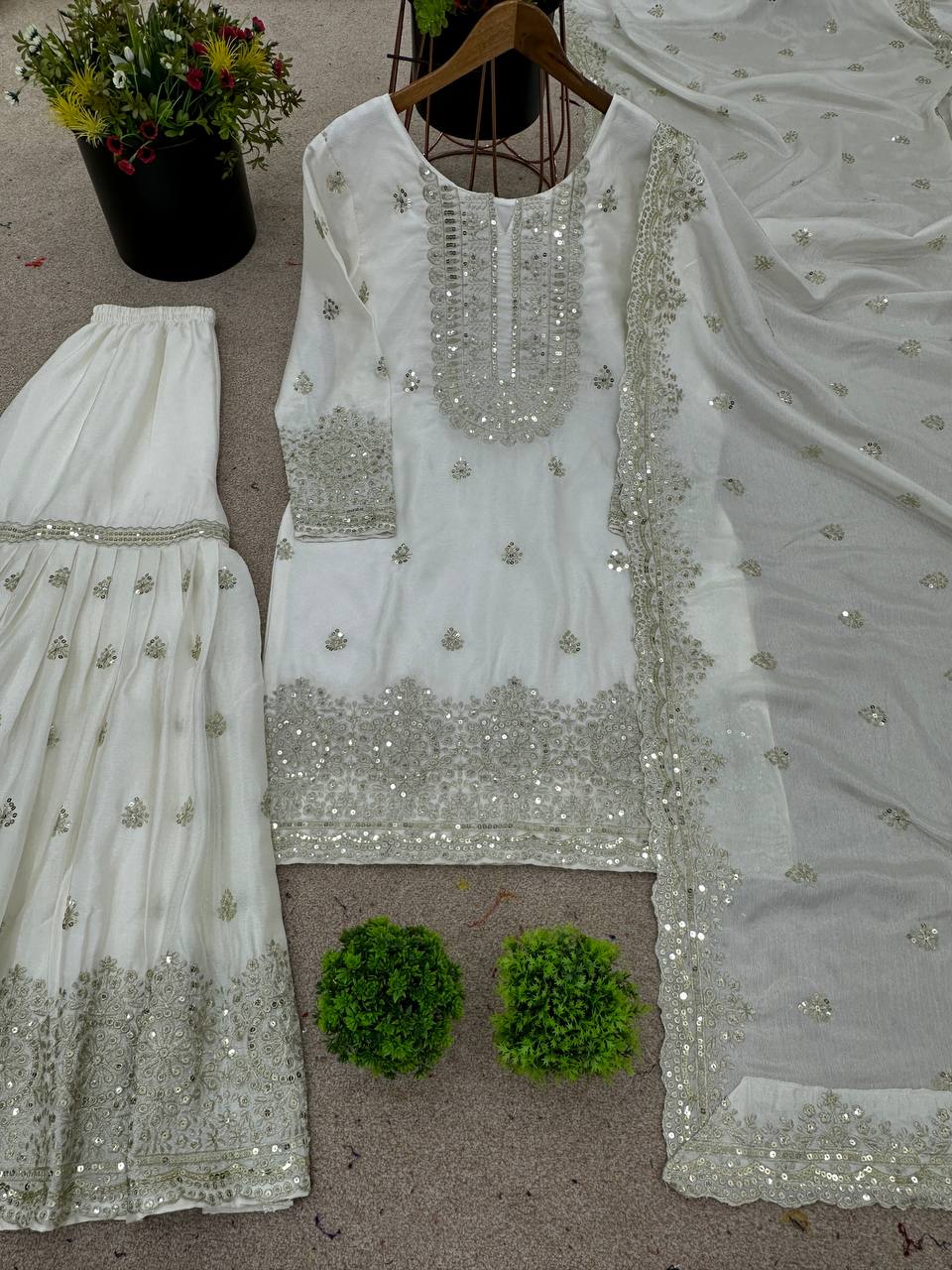 Flattering Chinnon Silk White Color Sharara Suit Set