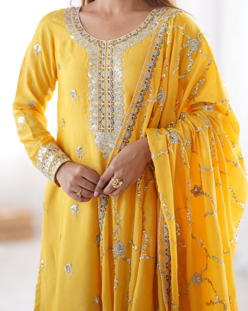 yellow chinnon embroidered kurta set