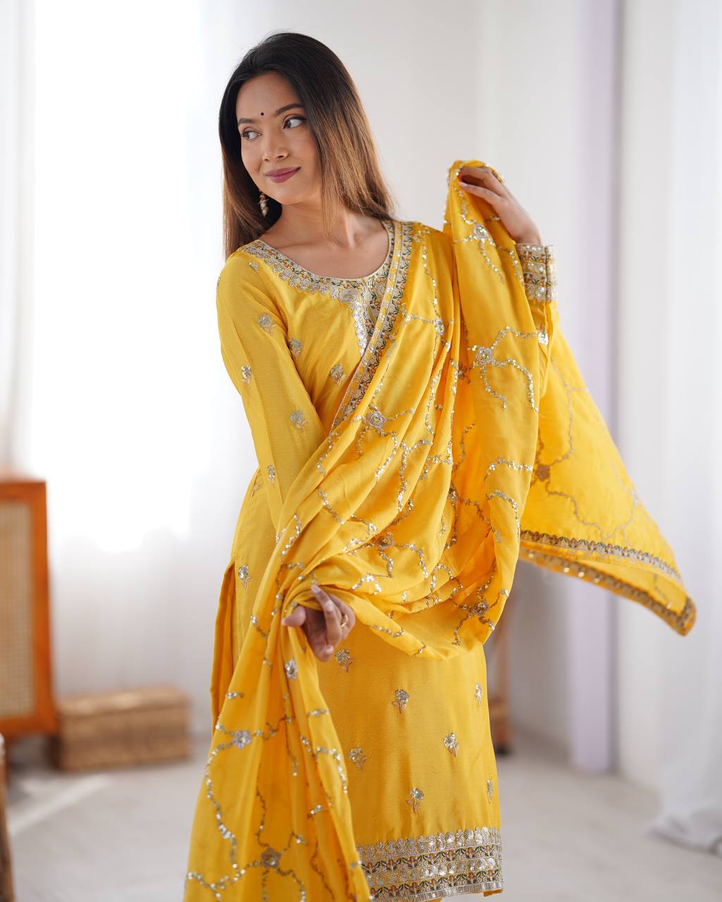yellow chinnon embroidered kurta set