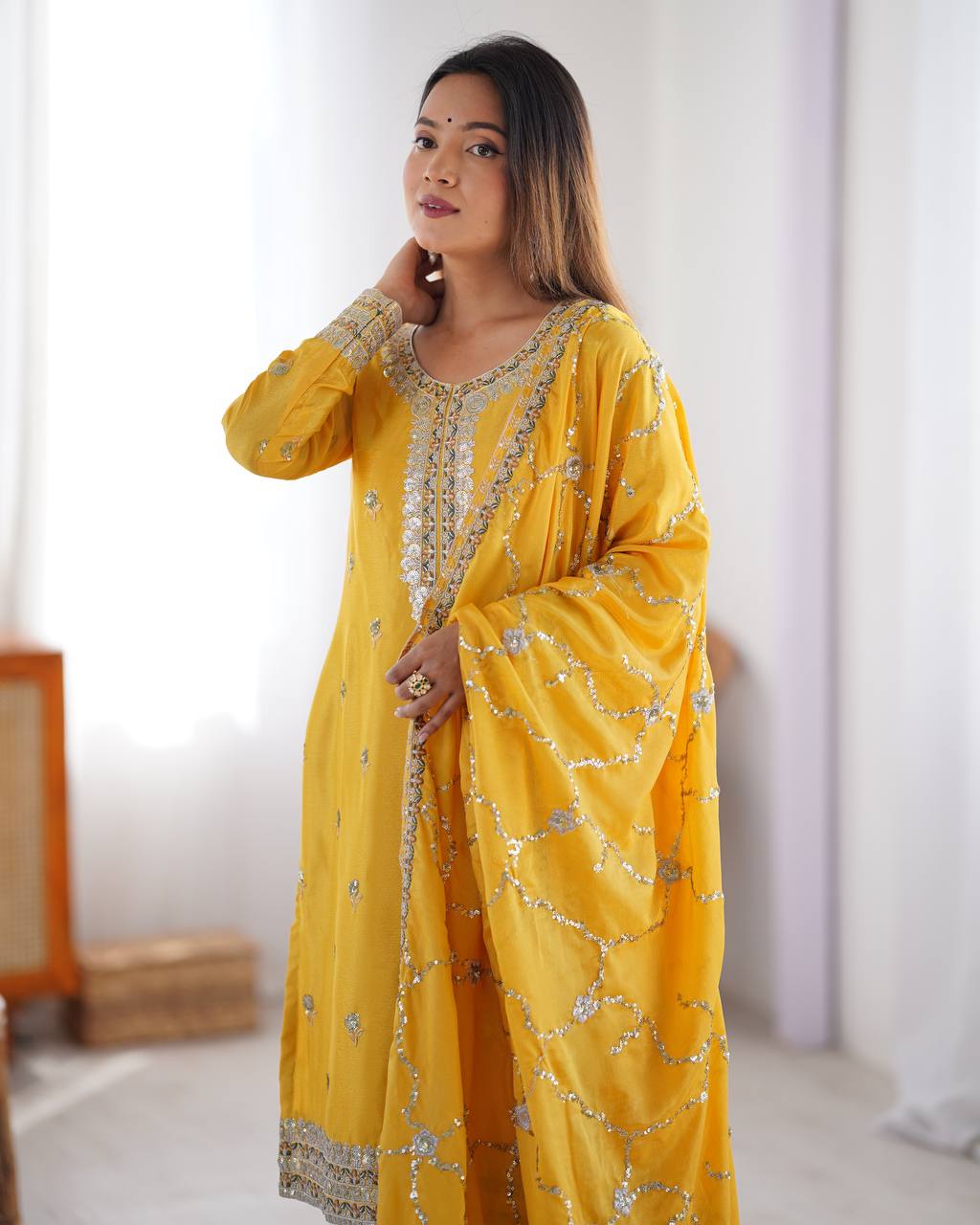 yellow chinnon embroidered kurta set