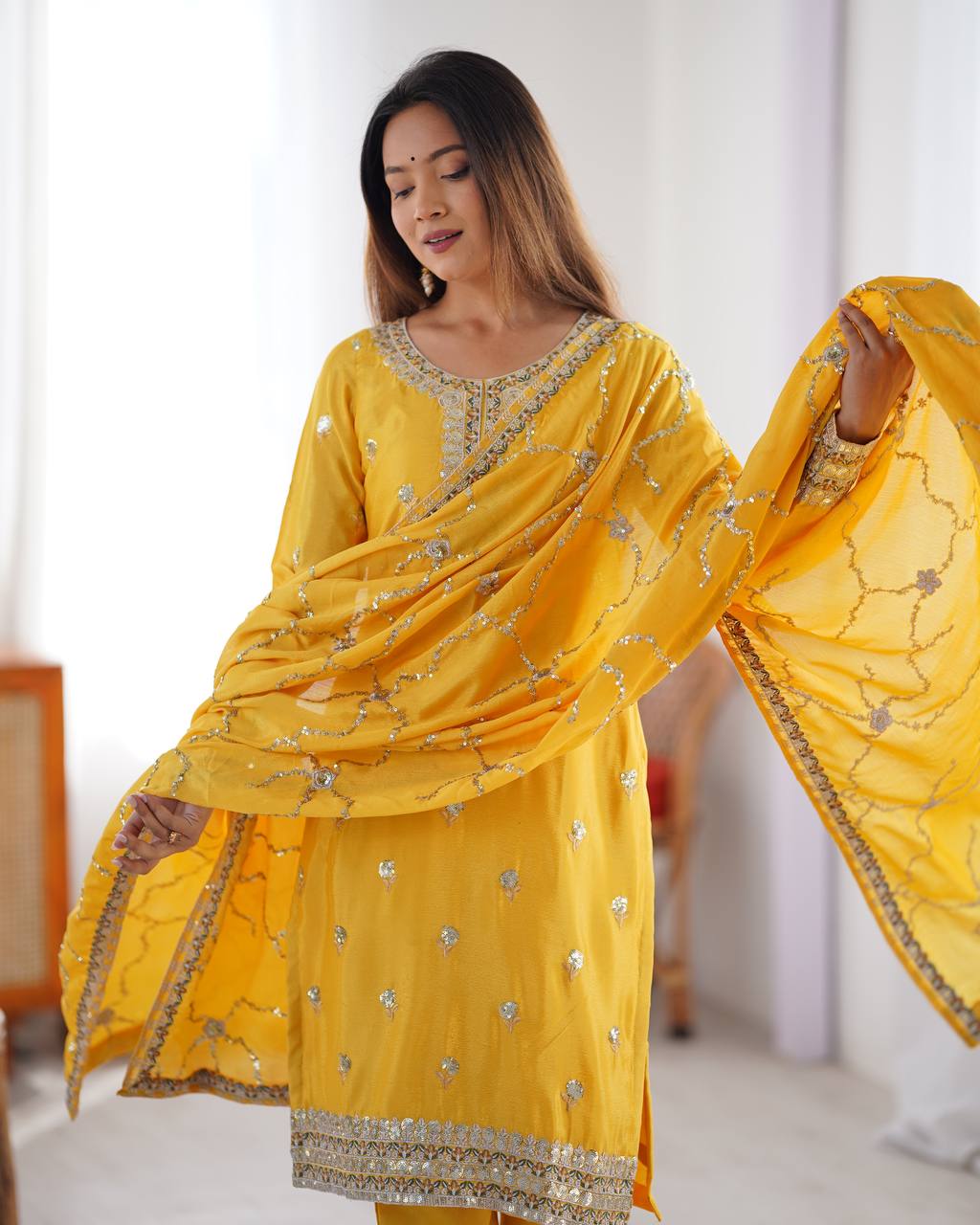 yellow chinnon embroidered kurta set