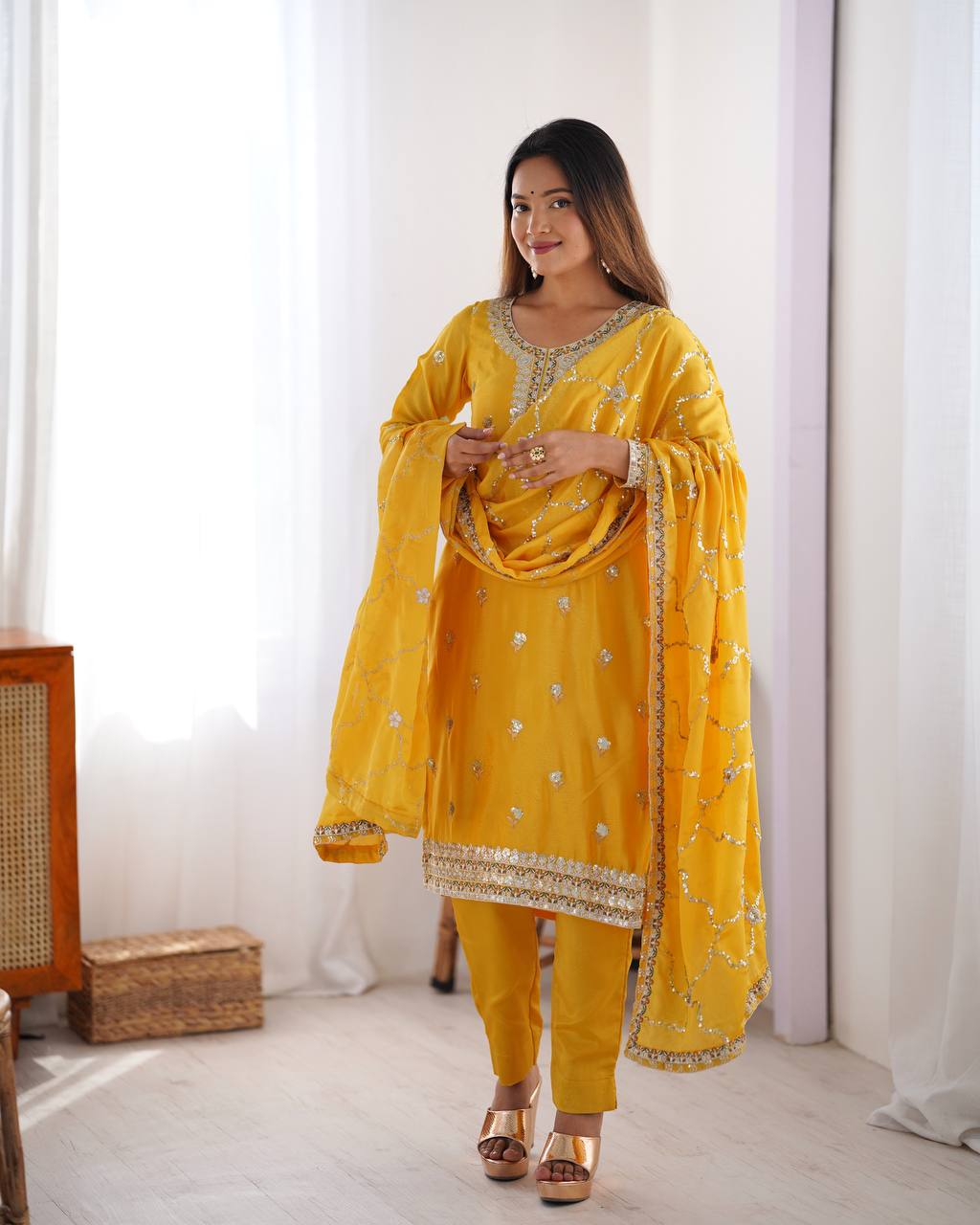 yellow chinnon embroidered kurta set