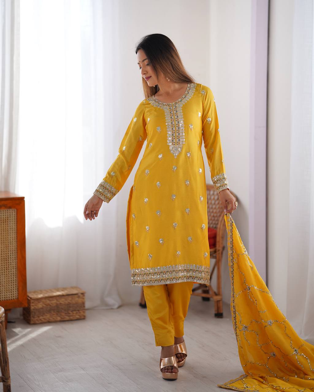 yellow chinnon embroidered kurta set