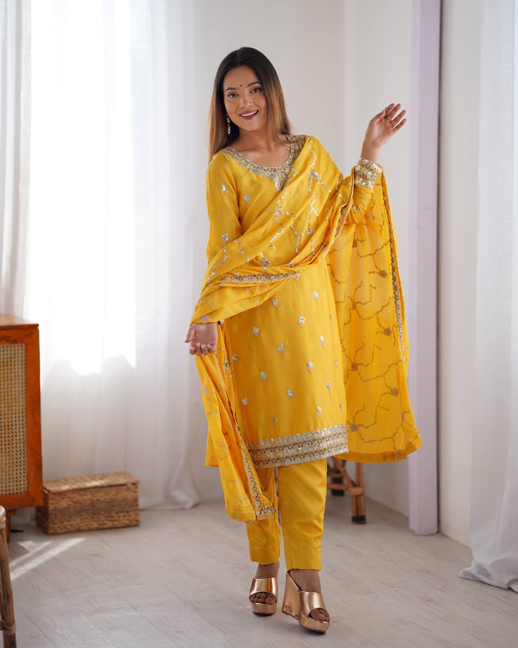 yellow chinnon embroidered kurta set