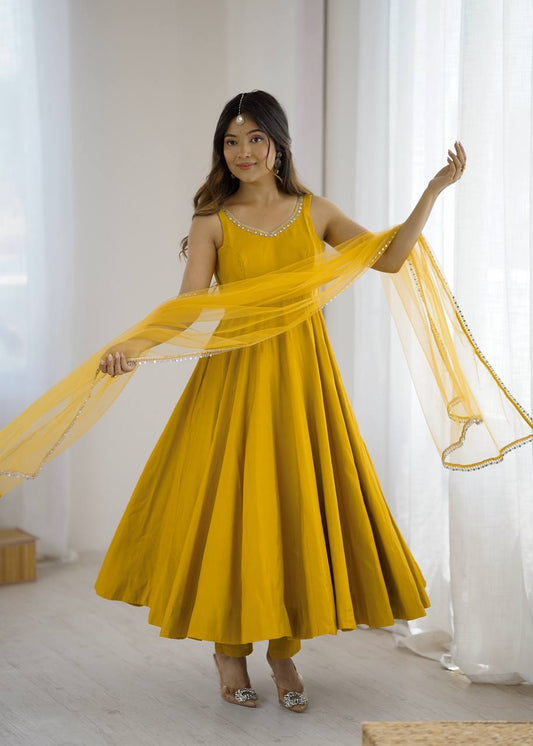 Attractive Yellow Color Roman Silk Lace Work Anarkali Suit