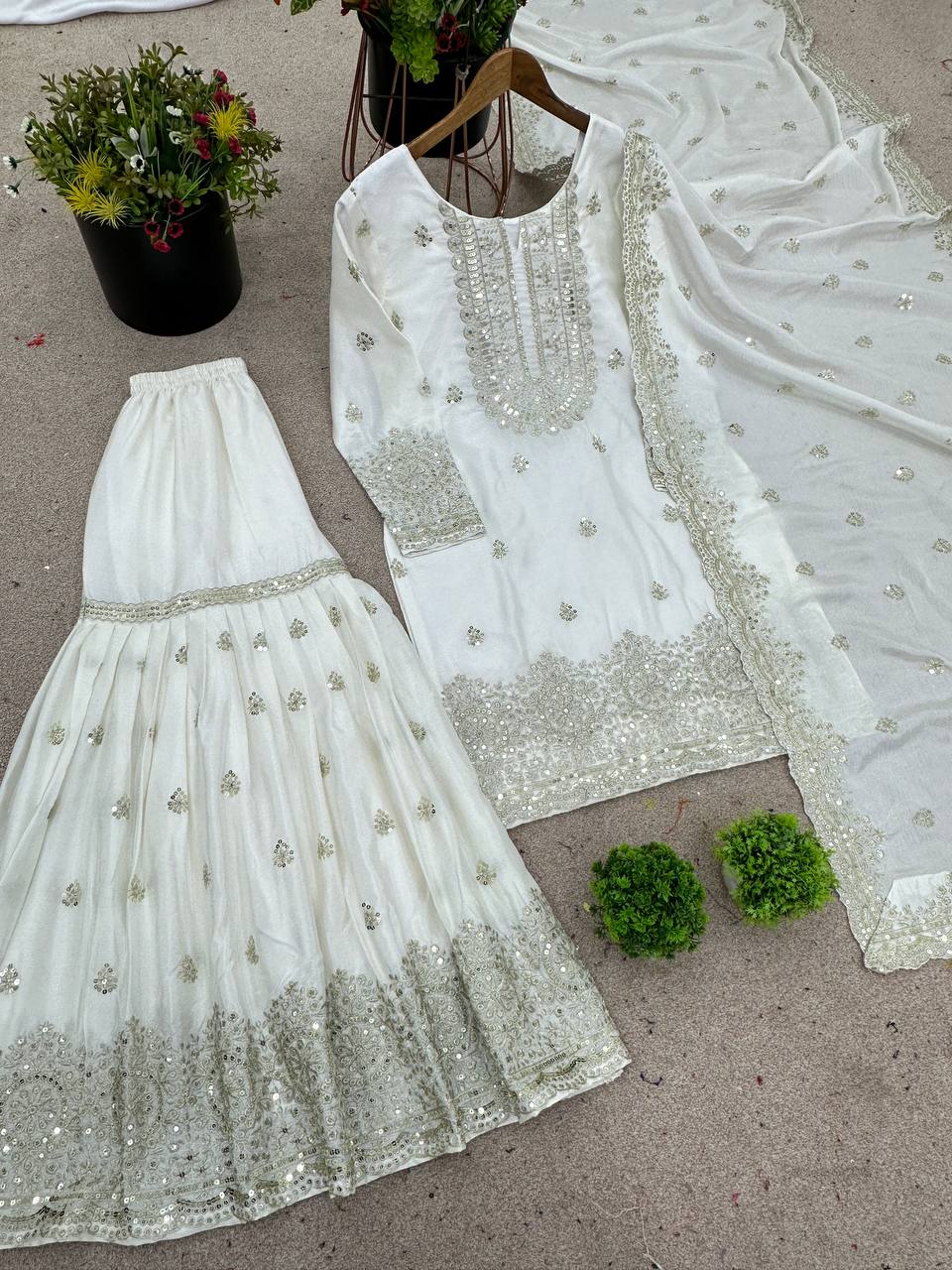 Flattering Chinnon Silk White Color Sharara Suit Set