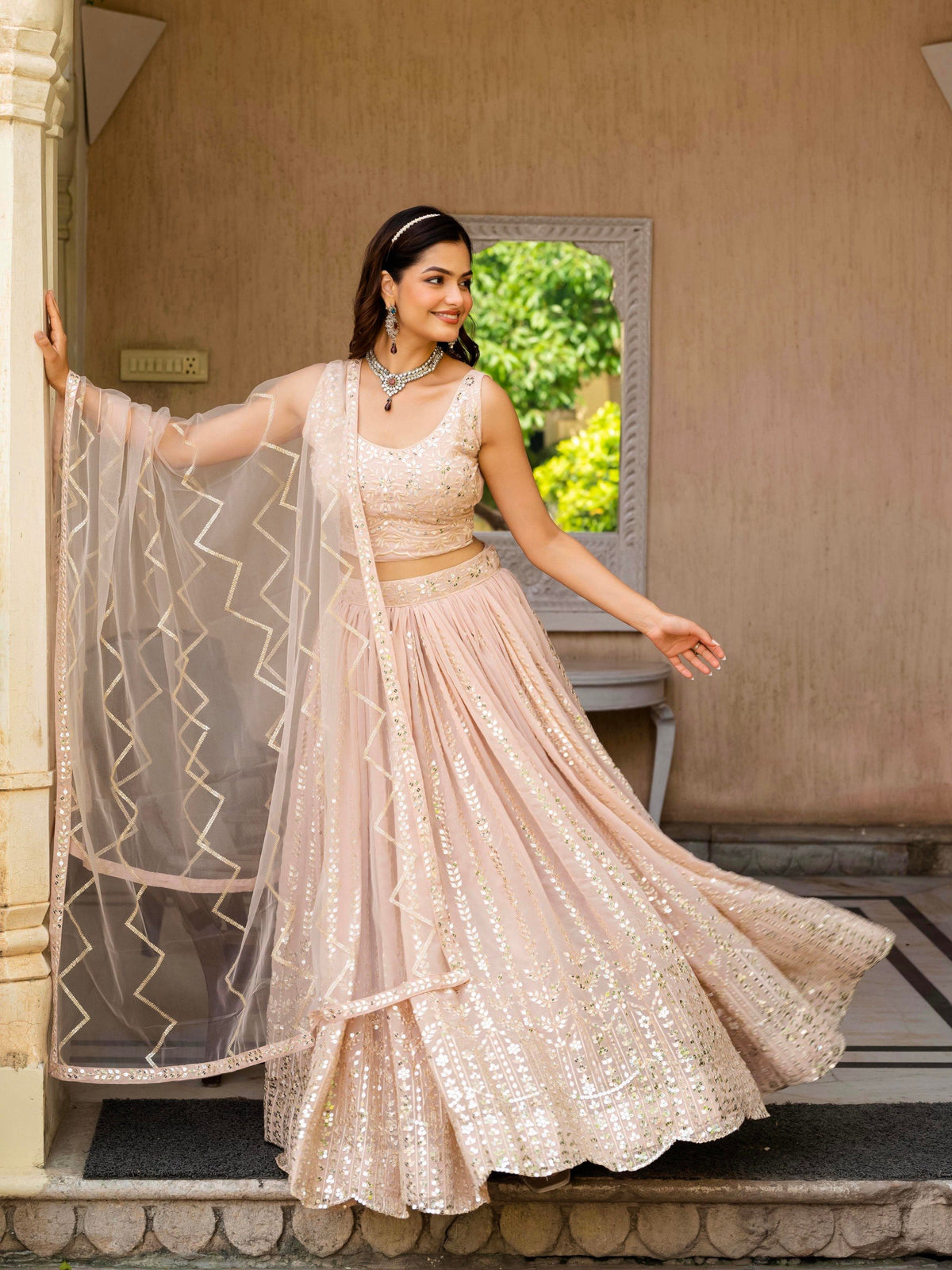 Peach Sequins Work Georgette Lehenga Choli With Net Dupatta