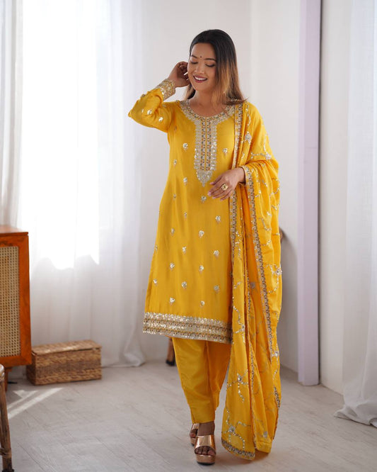 yellow chinnon embroidered kurta set